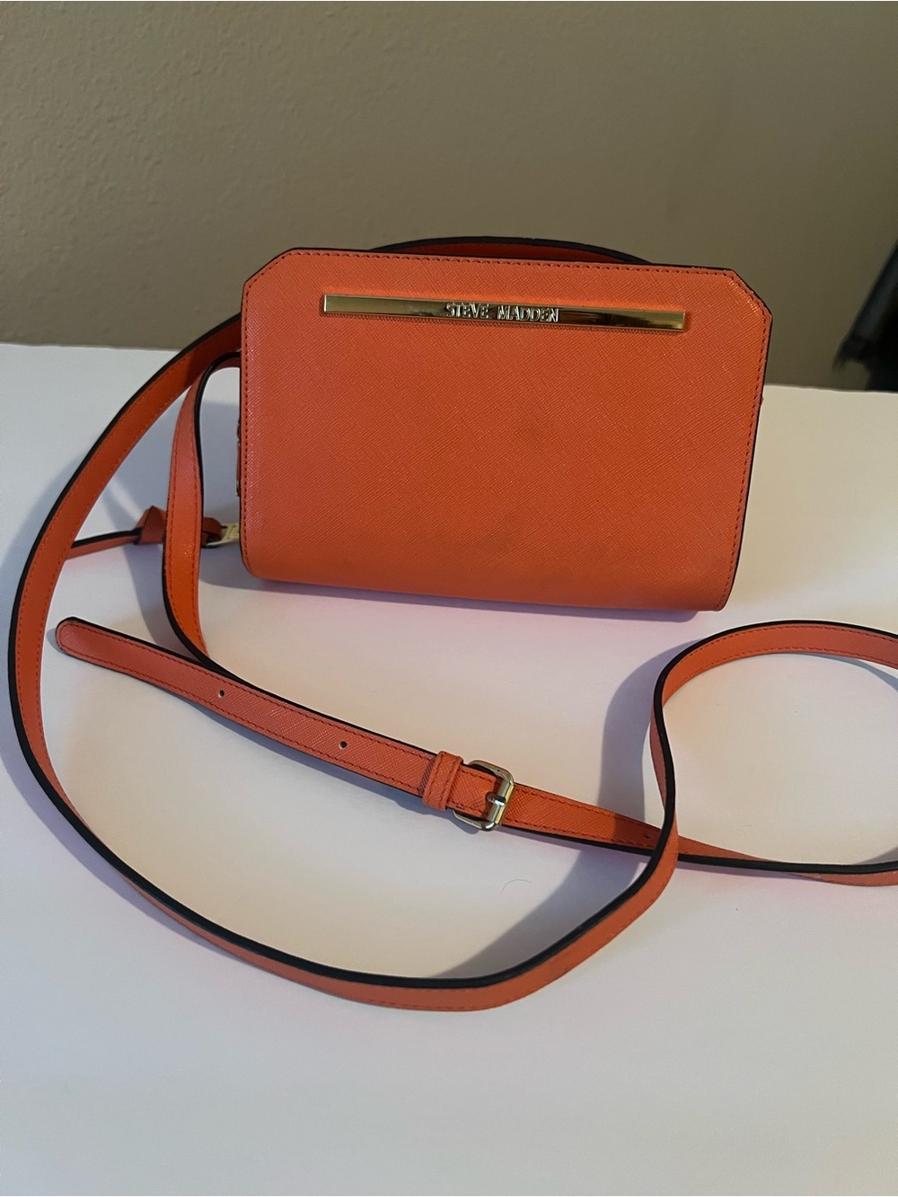 Steve Madden Coral Orange Crossbody with Gold Bar (light stains on the bag)